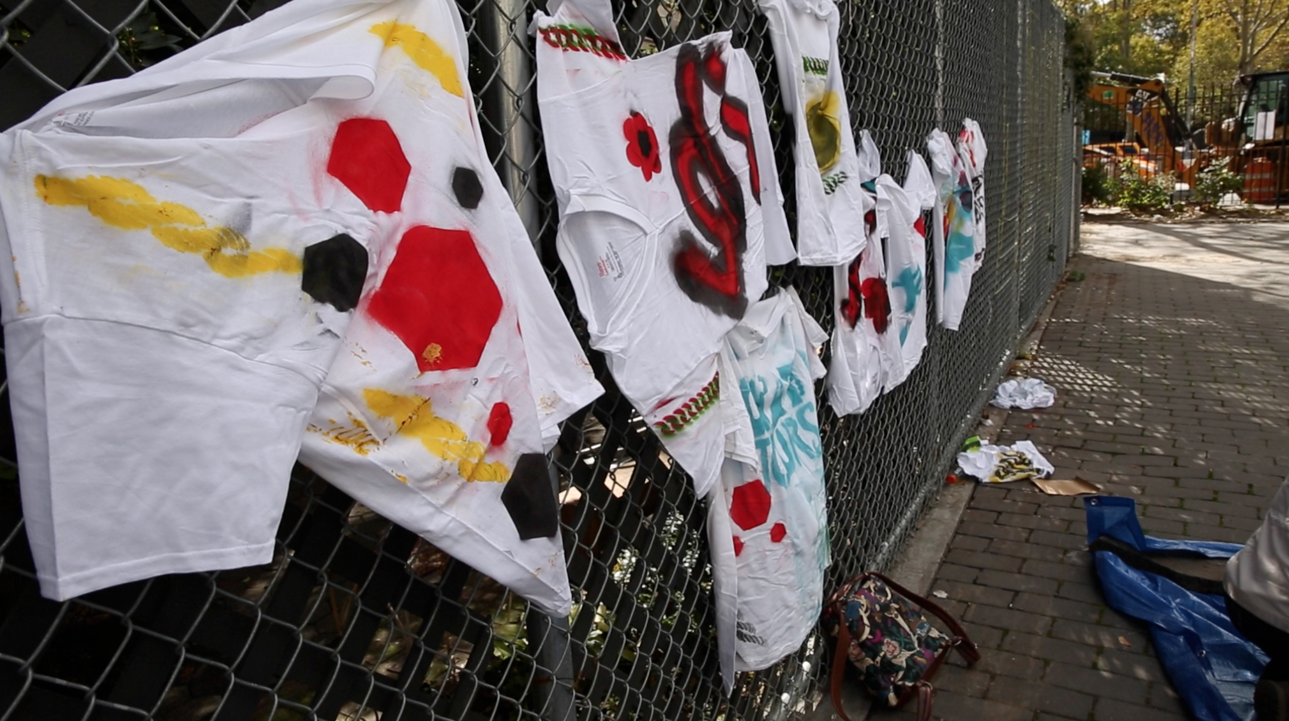 Student Tshirts being hung up to dry after the stencils have been applied