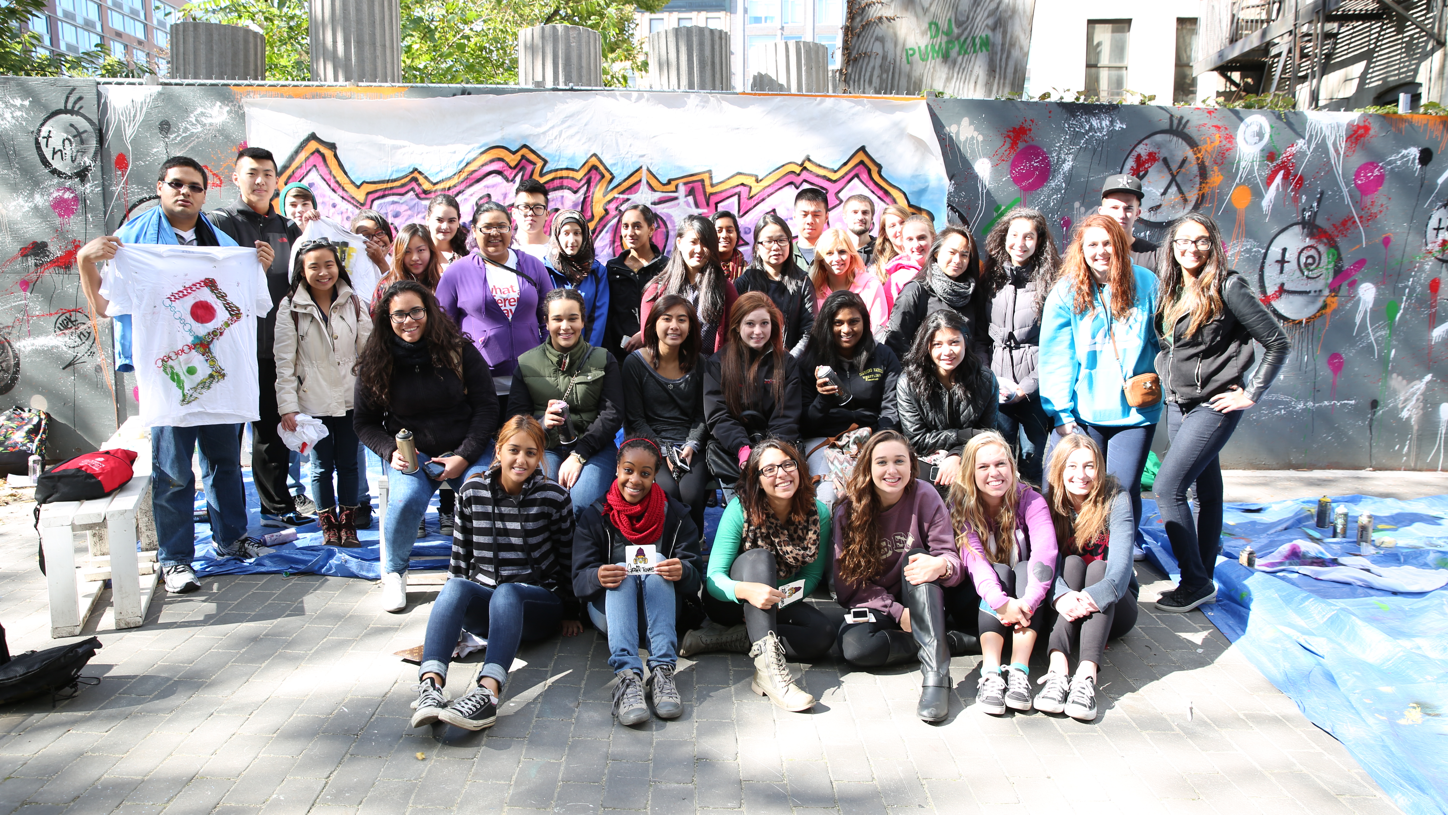 The St. Johns University Class in front of the finished masterpiece ?Discover NY? designed by Damien Mitchell and implemented by the class.