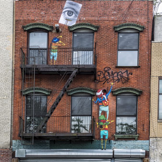 Os Gemeos x JR Collaboration on the Lower East Side