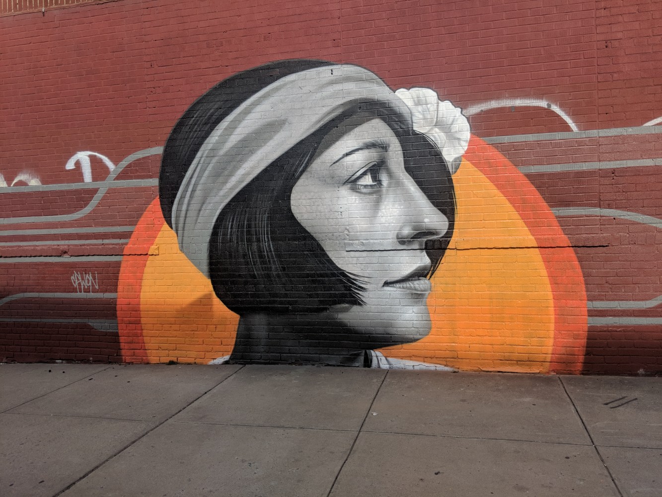 graffiti of woman on wall