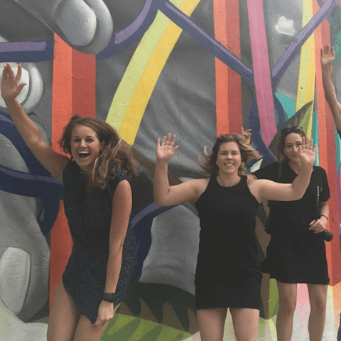 a group of people posing for the camera