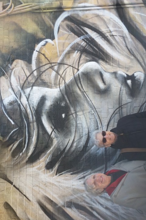 Two Young Ladies check out the new Starfightera on our Bushwick Collective Tour